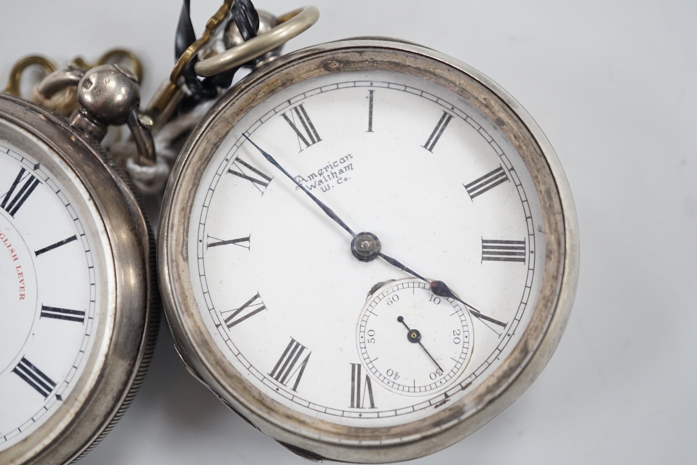 Two silver open face keywind pocket watches, Waltham and Graves of Sheffield.